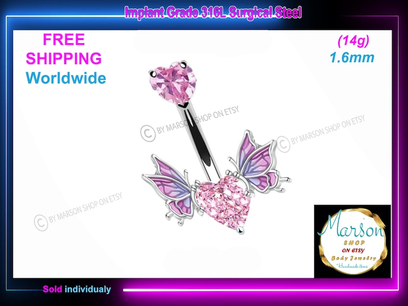 May include: A pink crystal heart with butterfly wings on either side, attached to a surgical steel belly button ring. The ring is 1.6 mm thick and 14 gauge. The text "Implant Grade 316L Surgical Steel" is at the top of the image. The text "(14g) 1.6mm" is at the top right of the image. The text "FREE SHIPPING Worldwide" is at the top left of the image. The text "Sold individually" is at the bottom of the image.