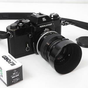Black Nikkormat EL Nikon 35mm Film Camera with Nikkor 50mm F:1.4 lens
