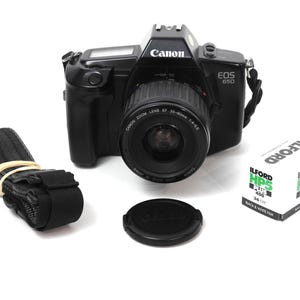 Canon EOS 650 Film Camera with EF 35-80mm lens + 1 roll of film