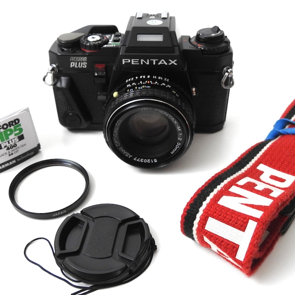 PENTAX PROGRAM Plus S.L.R film Black camera with SMC 50mm 2.0 Prime Lens+ 1 roll of film