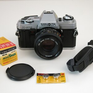 Minolta X-370 SLR film camera with 50mm 1.7 lens + Free Shipping to U.S.A. & Canada