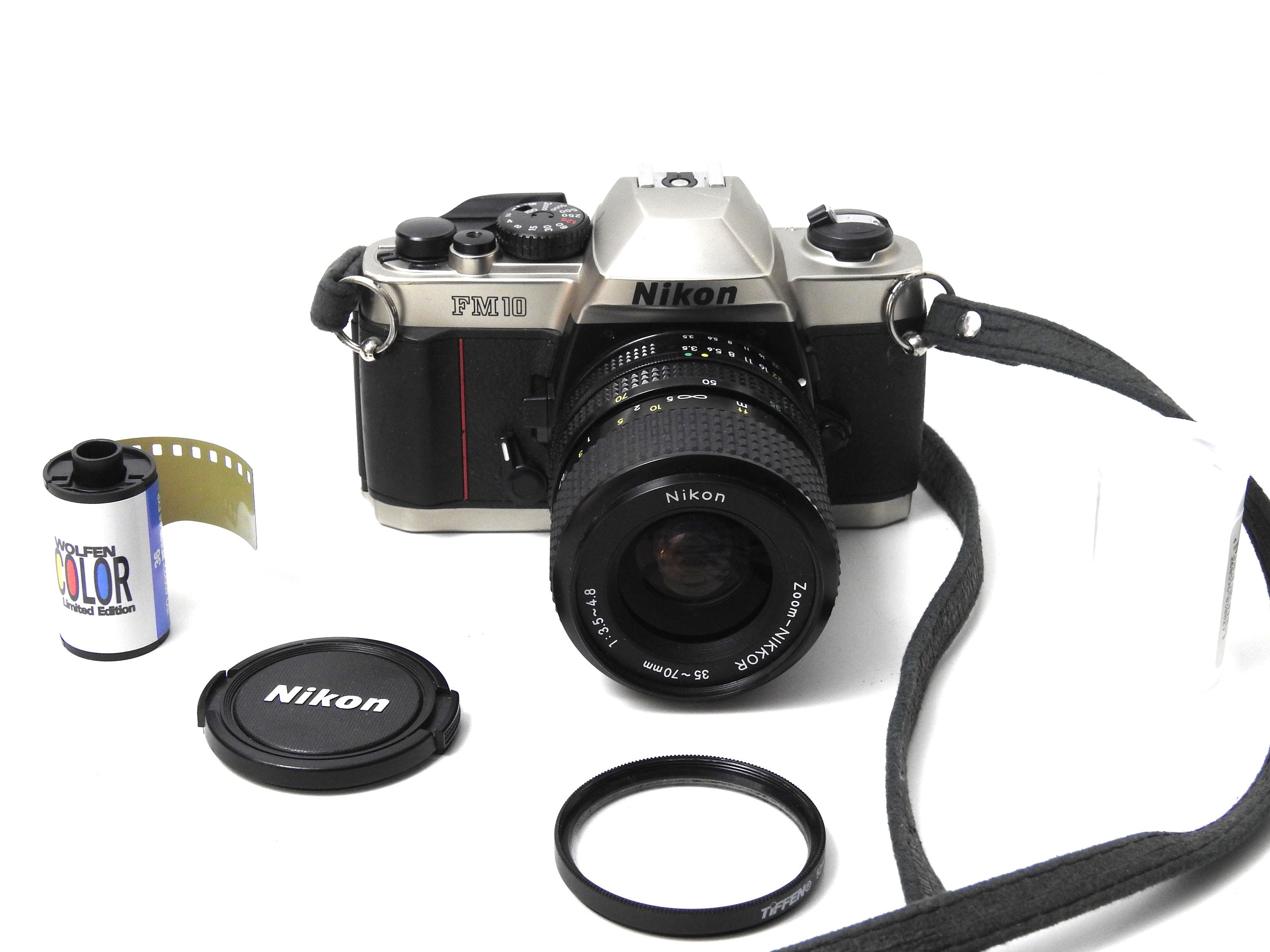 Nikon FM 10 35mm SLR Film Camera Nikkor 35-70mm Lens Roll of Color 