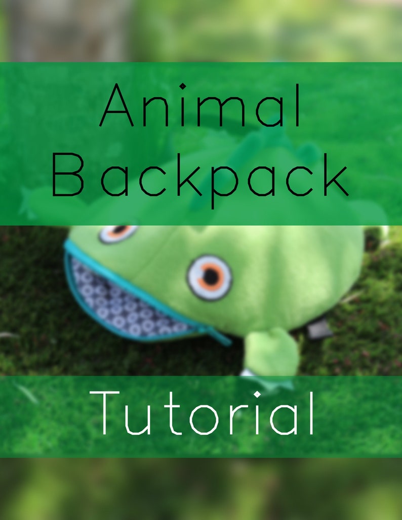 May include: Green plush animal backpack with a zippered mouth and large eyes. The backpack is lying on a bed of green moss. The text "Animal Backpack Tutorial" is displayed on the image.