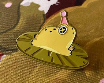 Pin de esmalte de rana nenúfar