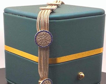 Pulsera de plata de ley esmaltada en azul: diseño de círculos en espiral.