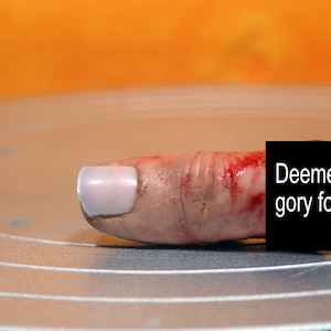 Bloody severed thumb. Perfect halloween decoration or horror prop