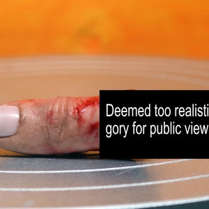 Bloody severed thumb. Perfect halloween decoration or horror prop