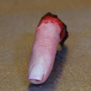 Bloody severed finger. Halloween decoration, pranks or horror prop image 2