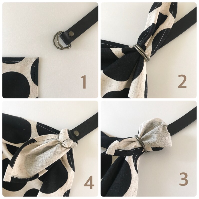 May include: A four-part instructional sequence showing how to secure a black and beige polka dot fabric through two metal D-rings attached to a black strap. The steps demonstrate threading the fabric through the rings to create a secure knot.