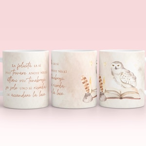 May include: White ceramic mug with a watercolor design of an owl perched on a book with feathers and inkwells. The text on the mug reads "La felicita la si puo trovare anche negli attimi piu tenebrosi se solo uno si ricorda di accendere la luce."