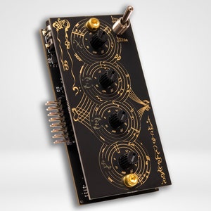 May include: Black electronic module with gold musical note designs and three black knobs. The module has a toggle switch and gold-colored connectors. The design includes musical notes and lines.
