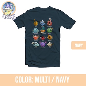 May include: A navy blue t-shirt with a graphic of 12 different Dungeons and Dragons character classes represented as dice. Each die has a different color and features a symbol representing the class. The text "Bard", "Fighter", "Barbarian", "Paladin", "Wizard", "Druid", "Sorcerer", "Rogue", "Ranger", "Cleric", "Warlock", and "Monk" is printed below each die.