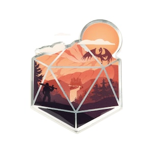 May include: A silver metal pin with a red, orange, and brown mountain landscape inside a 20-sided die. The landscape features a waterfall, a castle, a dragon, and a silhouette of a person holding a sword.