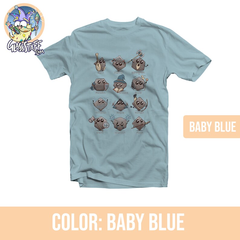 May include: A light blue t-shirt with a graphic of dice representing different Dungeons and Dragons character classes. The classes are: Bard, Fighter, Barbarian, Paladin, Wizard, Druid, Sorcerer, Rogue, Cleric, Warlocks, and Monk.