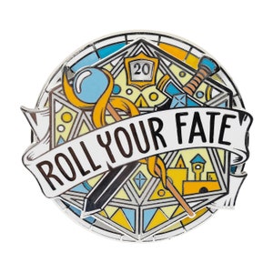 May include: A silver enamel pin with a yellow, blue, and white design. The pin features a 20-sided die, a sword, a staff, and a castle. The text "Roll Your Fate" is written on a banner.