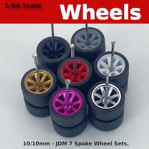 May include: Set of 10mm scale model car wheels with 7 spokes. The wheels are in various colors, including gold, red, black, silver, white, and pink.  10/10mm - JDM 7 Spoke Wheel Sets.