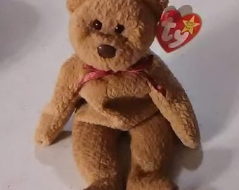 Ty ''  curly '' beanie baby