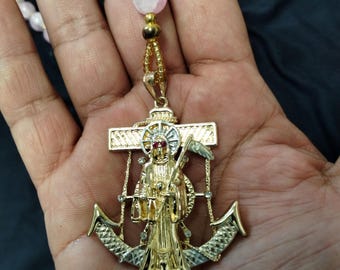 Rosarios Santa Muerte bañados en oro