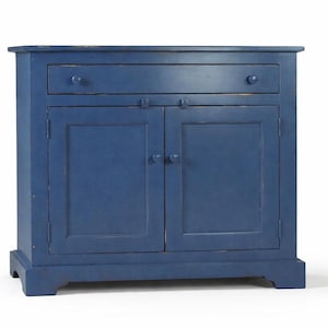 Handmade farmhouse buffet cabinet with paneled doors and drawer in deep blue Night-Time finish on white background.