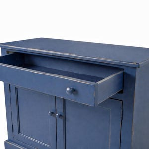 Farmhouse buffet cabinet with drawer open showing finished interior and solid wood construction.