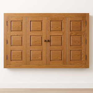 Handcrafted Phoenix TV Wall Cabinet made from rustic oak with raised-panel bi-fold doors and a Chestnut finish, mounted on a clean white wall.