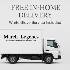 May include: A white delivery truck with black text on the side that reads March Legend INSPIRING HANDMADE FURNITURE. Above the truck, the text reads FREE IN-HOME DELIVERY and White Glove Service Included against a plain light gray background.