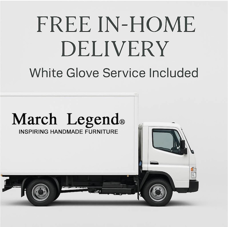 May include: A white delivery truck with black text on the side that reads March Legend INSPIRING HANDMADE FURNITURE. Above the truck, the text reads FREE IN-HOME DELIVERY and White Glove Service Included against a plain light gray background.