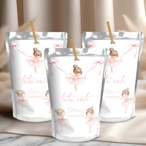 May include: Three white pouches with a ballerina illustration and the text "tutu cute" and "Olina's 2nd Birthday". Each pouch has a pink bow and a gold straw.
