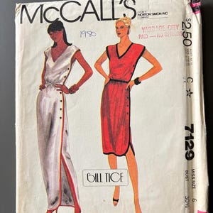 May include: Vintage McCall's sewing pattern from 1980 featuring two dress designs by Bill Tice. The pattern envelope shows illustrations of the dresses, one white with red trim and the other red with black trim. The bust size is 30.5 inches.