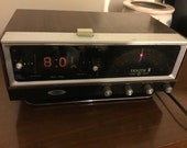 Vintage Zenith Circle of Sound Am Fm Solid State Radio with Clock and Alarm.