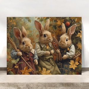 May include: A whimsical painting depicts three anthropomorphic rabbits in autumn attire. One rabbit holds a broom, another a basket, and the third a bundle of twigs. The background features fall foliage with golden leaves and red apples.