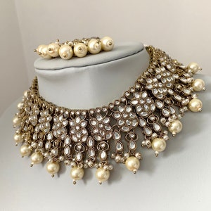 Kundan Silver and gold Indian choker set with earrings and tikka. Indian jewellery silver choker set, choker set, Indian jewelry,Kundan set