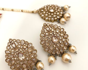 Asian/ Indian/ Pakistan Oval polki stoned earrings & tikka with grey beads.  Indian jewelry, Bollywood, tikka set, Asian jewellery