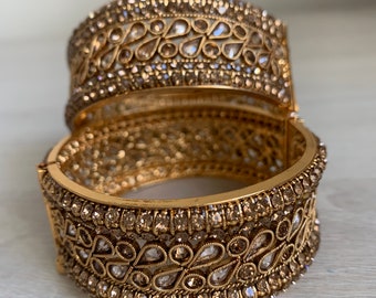 Asian/Indian/Pakistani gold pair of bangles.  Bangle set, bangles, Gujare, antique gold bangle set,gold bangle set, gold bangles, choori