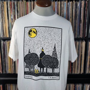 Surprise Graphic Tee: Spooky Woodcut Horror Shirt