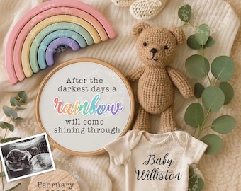 Può includere: Un arcobaleno di legno, un orsacchiotto all'uncinetto, scarpine e un body con la scritta "Baby Williston" sono disposti su una superficie morbida color crema. È presente anche un telaio da ricamo incorniciato con la scritta "After the darkest days a rainbow will come shining through", insieme a un'ecografia e un disco di legno con "February 2026".