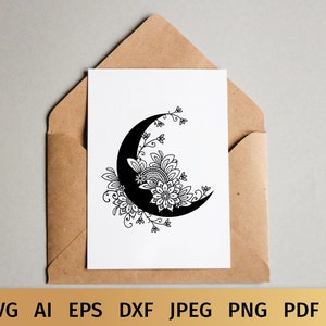 May include: A black and white illustration of a crescent moon with intricate floral designs.