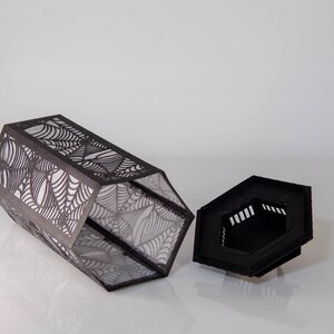 3d Halloween Paper Lantern SVG Design with Spider Web Pattern. This Led Candle Holder can be used for Home Decor and is Compatible with Cricut and Silhouette
