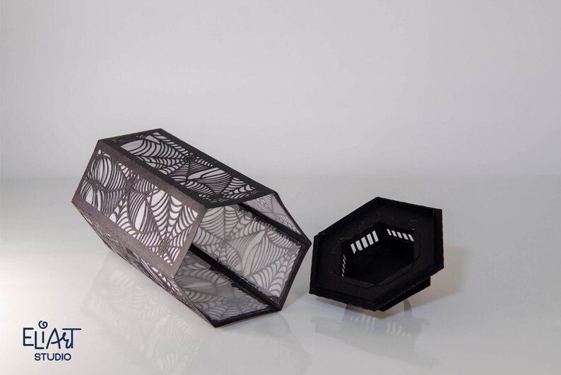 3d Halloween Paper Lantern SVG Design with Spider Web Pattern. This Led Candle Holder can be used for Home Decor and is Compatible with Cricut and Silhouette