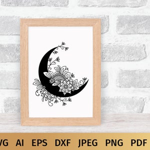 May include: A black and white illustration of a crescent moon with intricate floral designs.