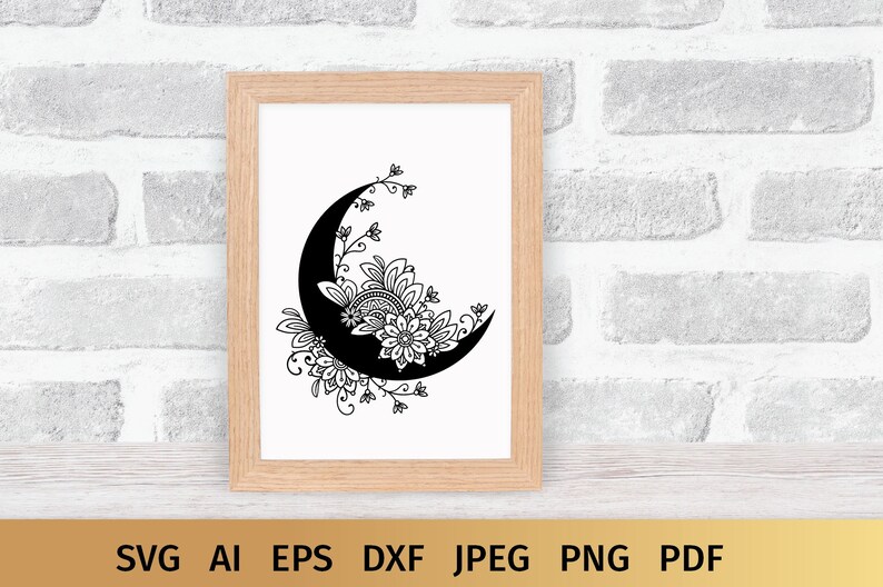 May include: A black and white illustration of a crescent moon with intricate floral designs.