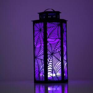 3d Halloween Paper Lantern SVG Design with Spider Web Pattern. This Led Candle Holder can be used for Home Decor and is Compatible with Cricut and Silhouette