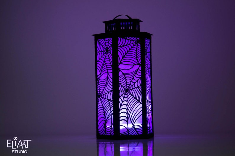3d Halloween Paper Lantern SVG Design with Spider Web Pattern. This Led Candle Holder can be used for Home Decor and is Compatible with Cricut and Silhouette