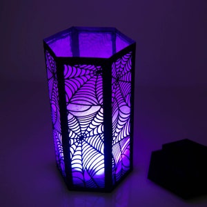 3d Halloween Paper Lantern SVG Design with Spider Web Pattern. This Led Candle Holder can be used for Home Decor and is Compatible with Cricut and Silhouette