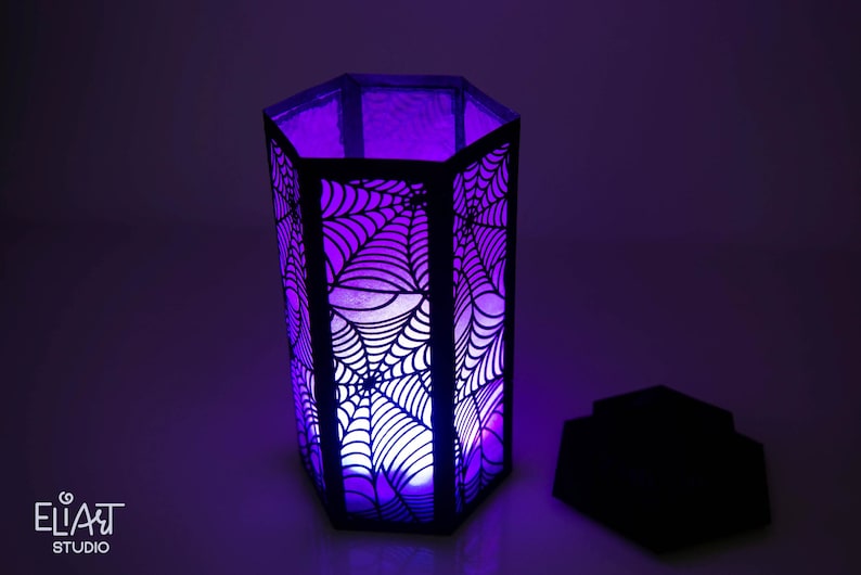 3d Halloween Paper Lantern SVG Design with Spider Web Pattern. This Led Candle Holder can be used for Home Decor and is Compatible with Cricut and Silhouette