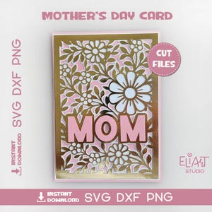 Könnte beinhalten: Eine rosa Muttertagskarte mit goldenem Rand und floralem Ausschnitt. Das Wort "MOM" ist prominent in Rosa dargestellt. Die Karte enthält den Text "SVG DXF PNG" und "CUT FILES".