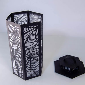 3d Halloween Paper Lantern SVG Design with Spider Web Pattern. This Led Candle Holder can be used for Home Decor and is Compatible with Cricut and Silhouette