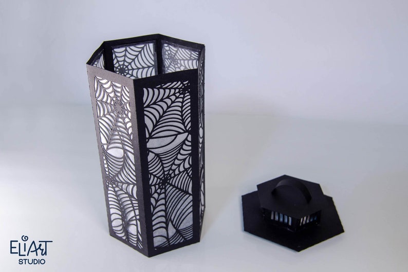 3d Halloween Paper Lantern SVG Design with Spider Web Pattern. This Led Candle Holder can be used for Home Decor and is Compatible with Cricut and Silhouette