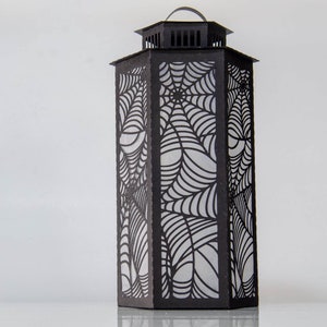 3d Halloween Paper Lantern SVG Design with Spider Web Pattern. This Led Candle Holder can be used for Home Decor and is Compatible with Cricut and Silhouette
