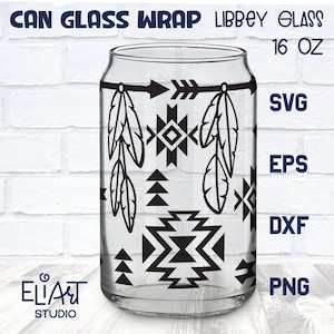 May include: A clear glass can with a black and white geometric design featuring feathers and an arrow. The design includes a repeating pattern of triangles and squares. The can is labeled "Libbey Glass 16 oz".